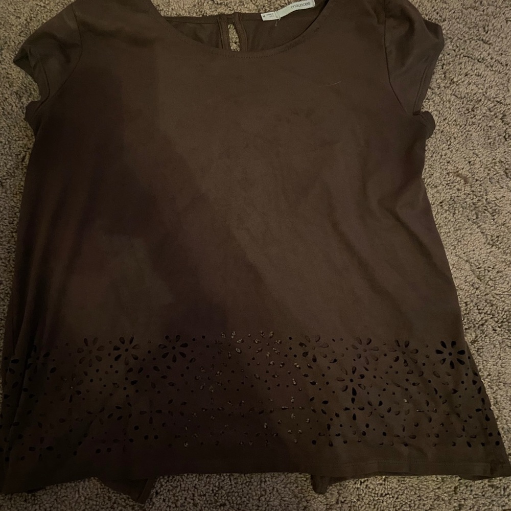 Maurice’s top with flower cutouts and slit back